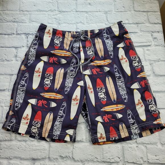 Nautica Blue and Tan Swim Trunks with Surfboard Pattern